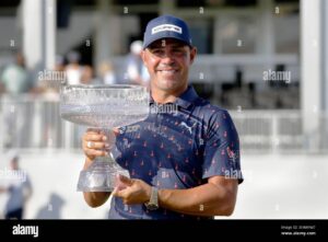 gary-woodland-holds-the-championship-trophy-after-winning-the-texas-childrens-houston-open-golf-tournament-sunday-march-29-2026-in-houston-ap-photomichael-wyke-3E4WYW7
